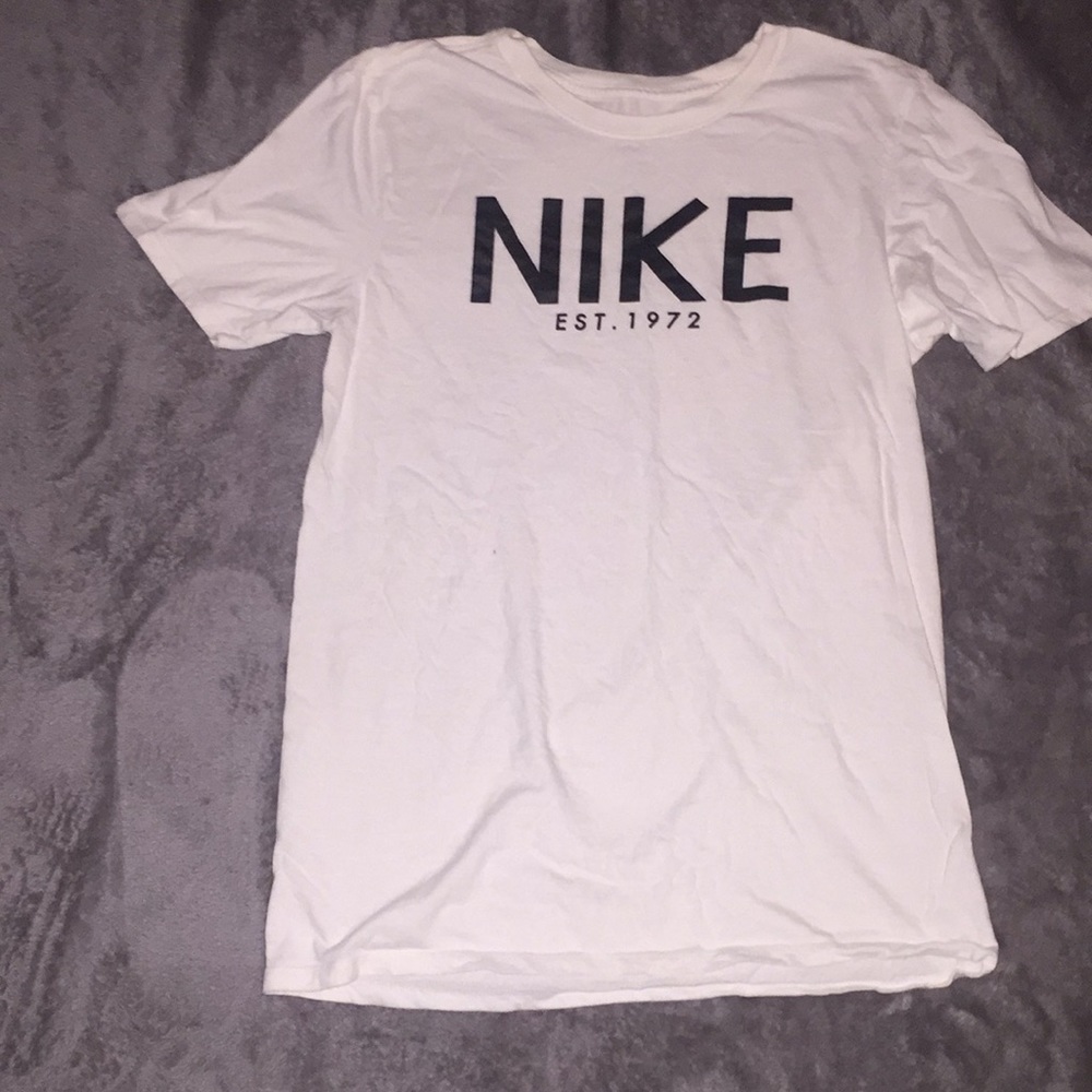 White and black nike shirt